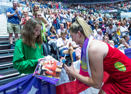 Picture by Allan McKenzie/SWpix.com - 17/07/2019 - Netball - Vitality Netball World Cup - Trinidad & Tobago v England - M&S Bank Arena, Liverpool, England - England's Francesca Williams signs autographs for fans after her side's victory over Trinidad & Tobago in the netball world cup. | SWpix.com